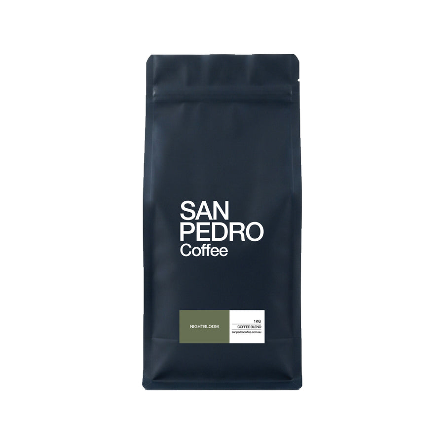 A dark navy blue stand-up coffee bag with white text reading 'SAN PEDRO Coffee' and a small green and white label near the bottom, shown on a plain white background.