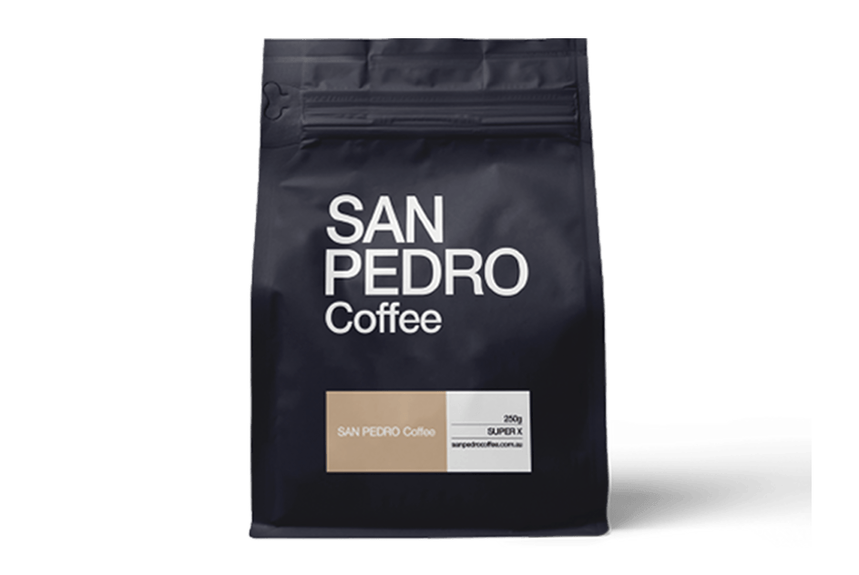 SUPER X coffee beans by San Pedro Coffee in a 250g matte black resealable bag, ideal for espresso with notes of dark chocolate, hazelnuts, and caramel.
