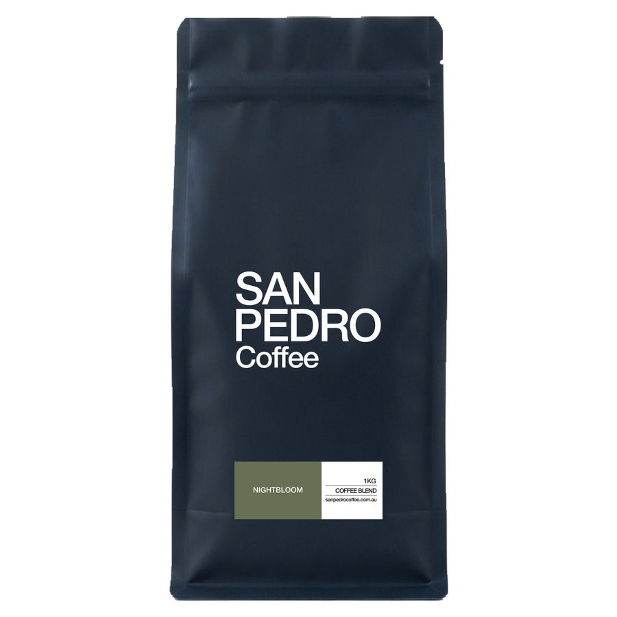 A dark navy blue stand-up coffee bag with white text reading 'SAN PEDRO Coffee' and a small green-and-white label near the bottom, shown on a plain white background.