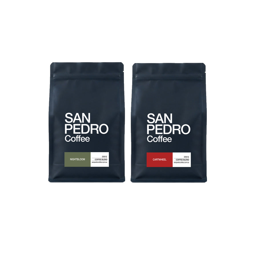Two San Pedro Coffee bags side by side on a white background, one labeled Nightblow with an olive green label and the other labeled Caramel with a red label.